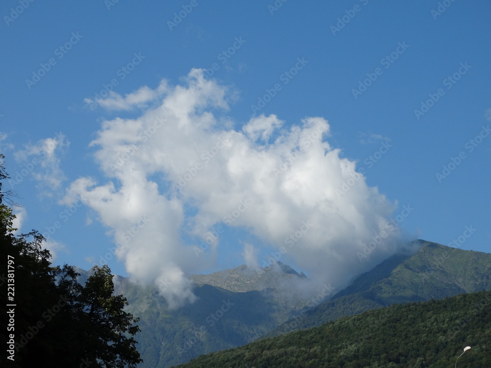 Clouds over mountains. Caucasus. Russia