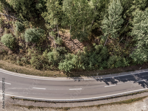 Aerial view of a lonely asphalted country road in the Harz Mountains . photo