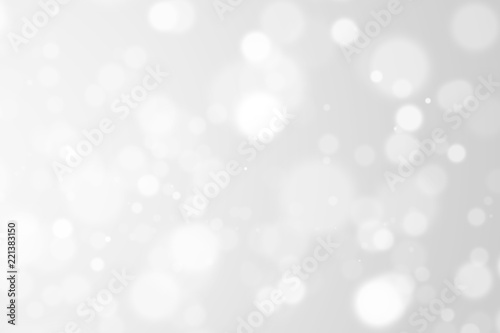silver bokeh light background beautiful bright blurred glitter effect. decoration for your design