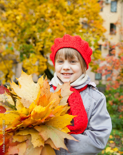 Girl posing with leaves