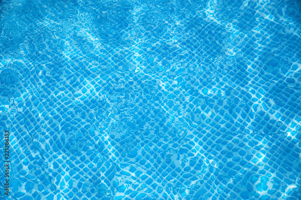 Blue and bright ripple water and surface in swimming pool , Beautiful motion gentle wave in pool Blue and bright ripple water and surface in swimming pool , Beautiful motion gentle wave in pool