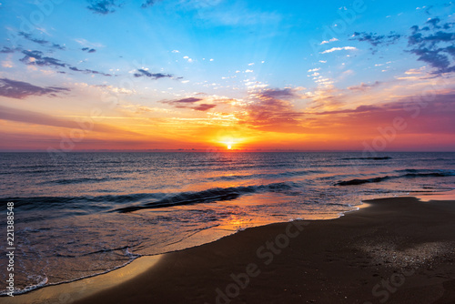 Fototapeta Naklejka Na Ścianę i Meble -  Amazing colorful sunrise at sea