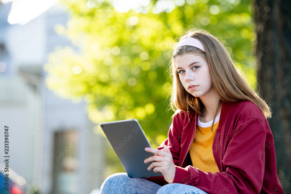 Young girl student with tablet Young girl student with tablet