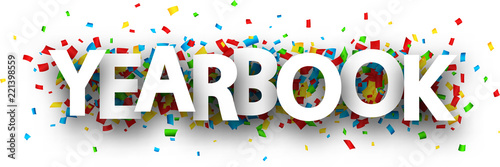 Yearbook sign with colorful confetti.
