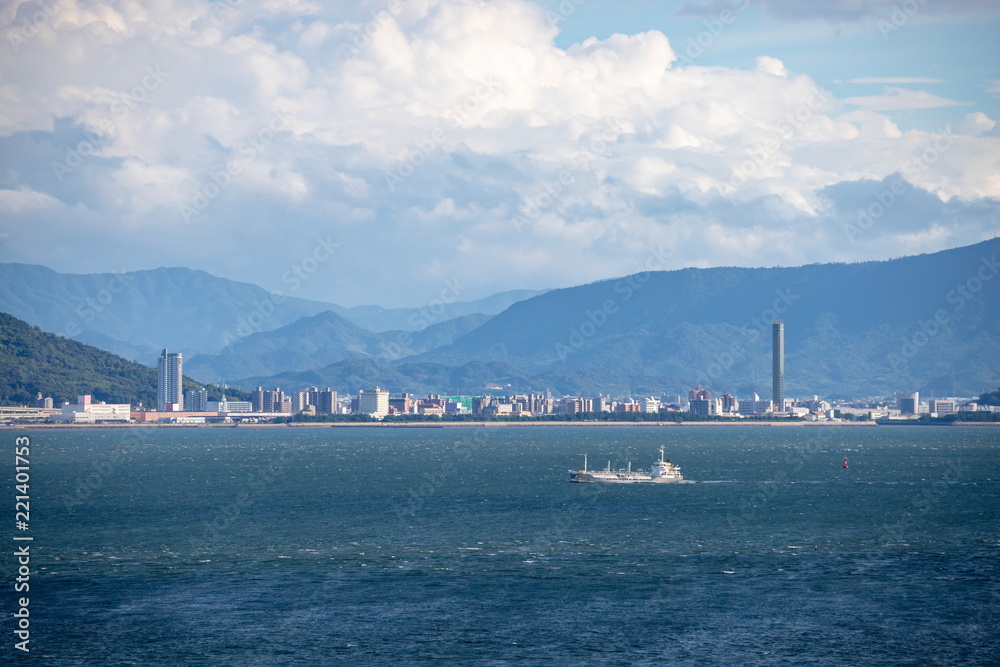 Seascape of the seto inland sea(a sailing ship and distant view of Utazu) ,Shikoku,Japan