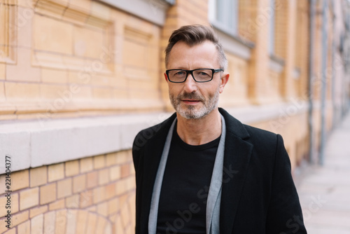 Free Download Portrait of mature, metro man walking on street - GFXLoad