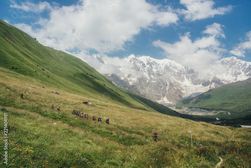 mountain snow tops and tourists