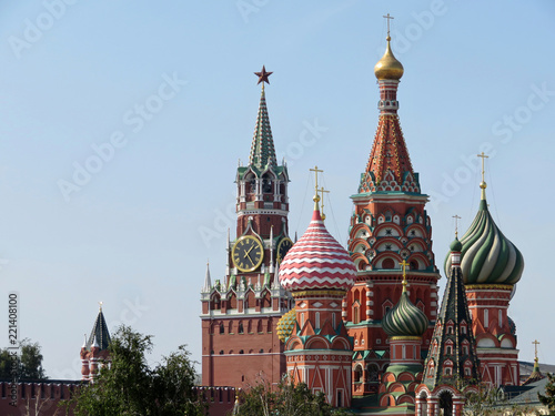 View of the Moscow Kremlin and St. Basil's Cathedral against the blue sky. Russian architecture landmark, tourist famous places of Russia