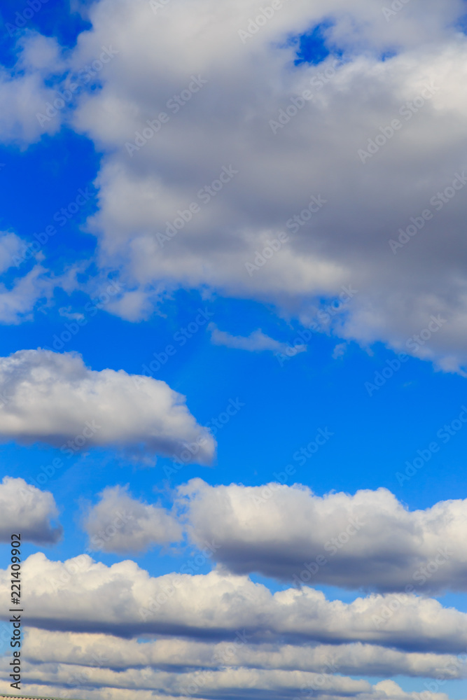 Fototapeta premium Clouds in the blue sky as an abstract background