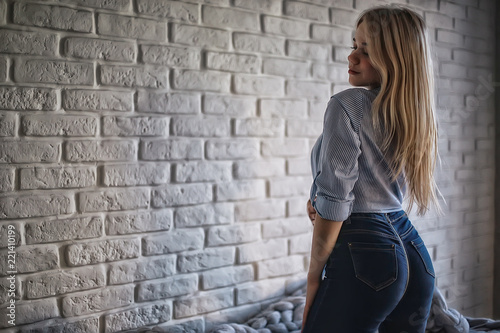 young sexy model / portrait of a beautiful young woman, blonde in a sexy pose, style
