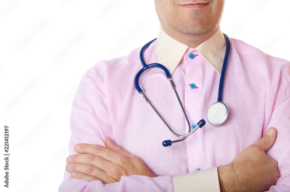 Doctor with a stethoscope stands with crossed arms on white background Doctor with a stethoscope stands with crossed arms on white background