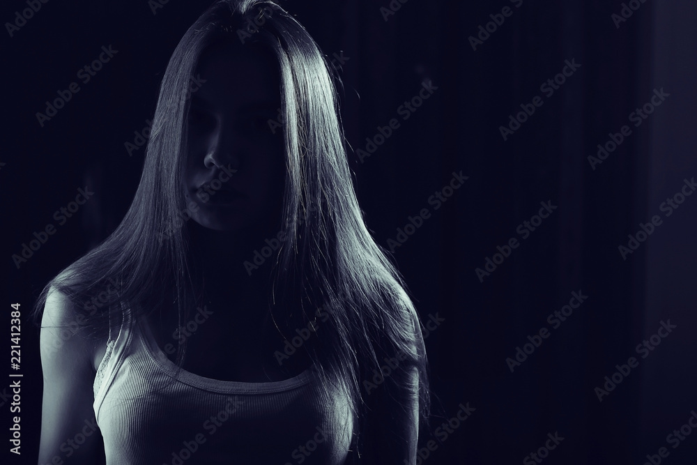 young adult sexy woman in a white tank top young adult sexy woman in a white tank top
