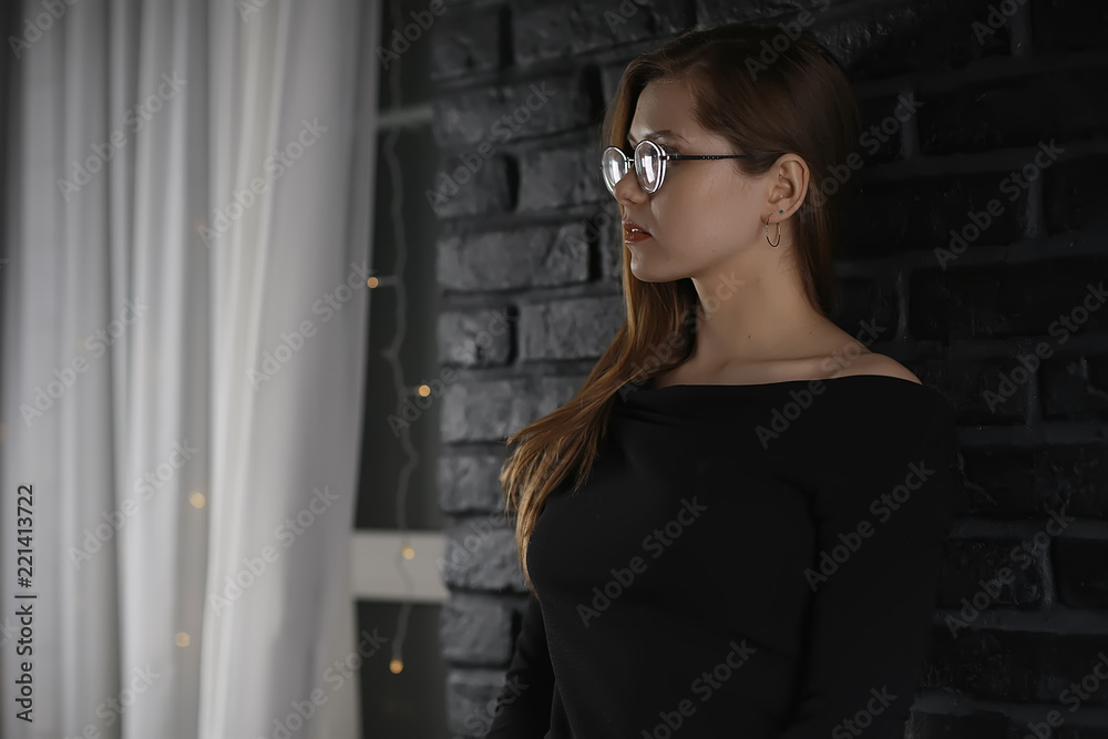 serious young woman with glasses / businesswoman serious look in glasses. concept vision business, youth