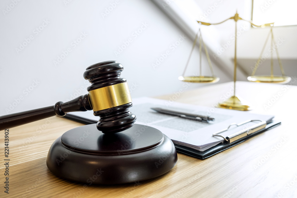Scales of justice and Gavel on sounding block, object and law book to working with judge agreement in Courtroom, Justice and Law concept Scales of justice and Gavel on sounding block, object and law book to working with judge agreement in Courtroom, Justice and Law concept