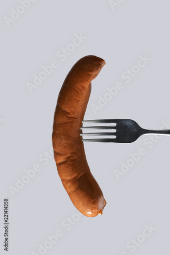 Photography hot dog in a fork