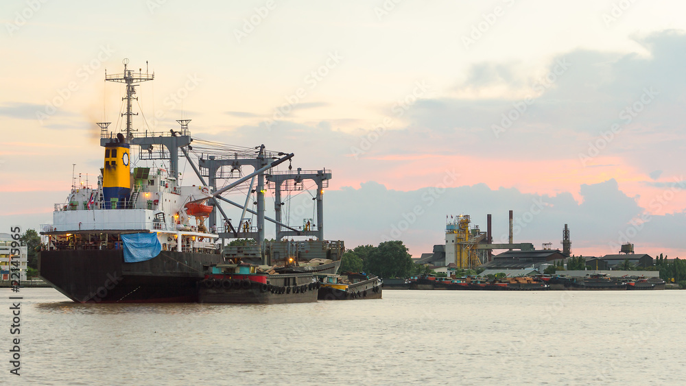 A large cargo ship in the Chao Phraya River