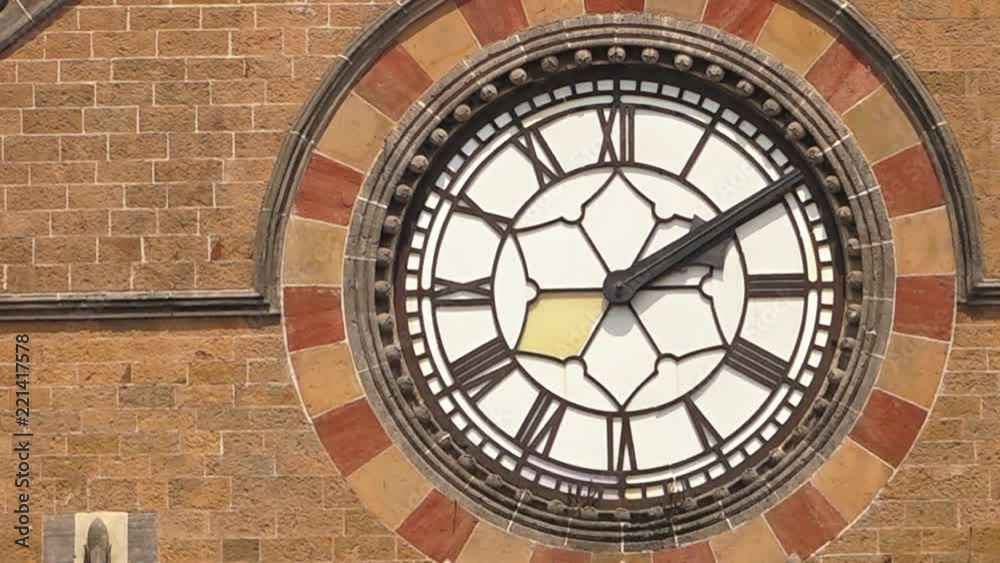 A static close up of a clock on a building A static close up of a clock on a building