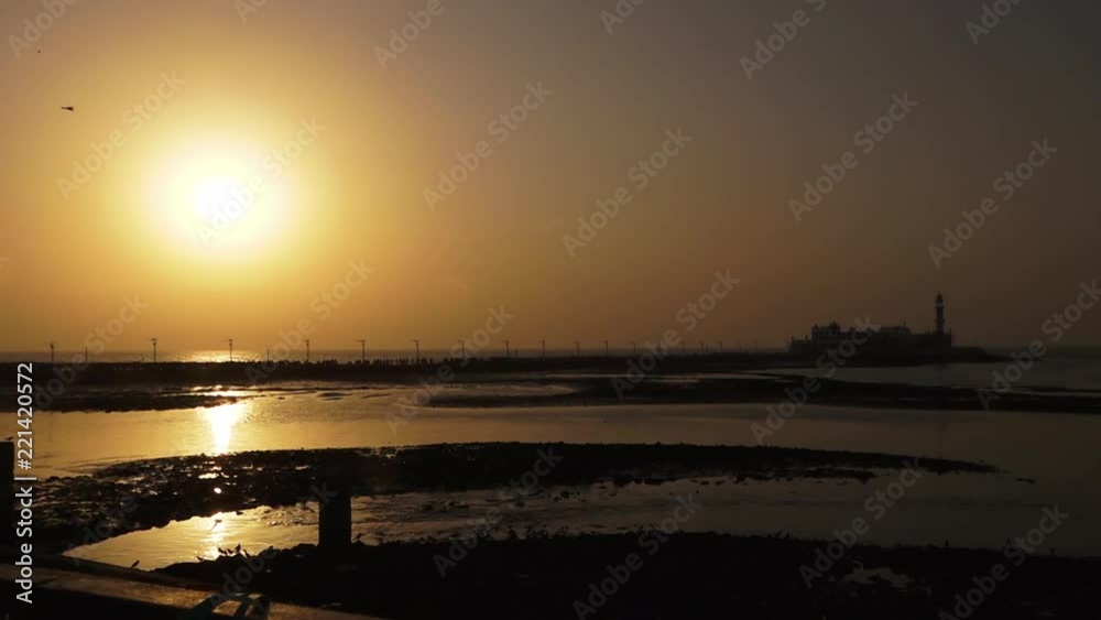 A wide shot of a gorgeous sun set in this static shot A wide shot of a gorgeous sun set in this static shot