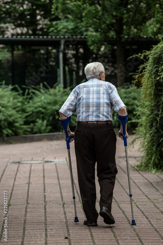 old man with walking frame