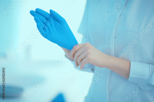 doctor in rubber gloves / concept sterility purity, medical clinic, laboratory, gloves on the hands of a doctor