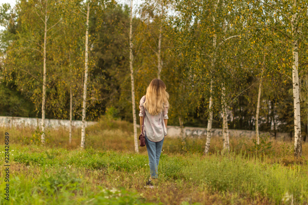 Women in the autumn forest