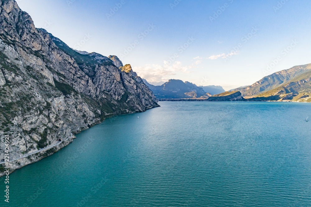 Aerial drone view of road and tunnels over Lake Garda