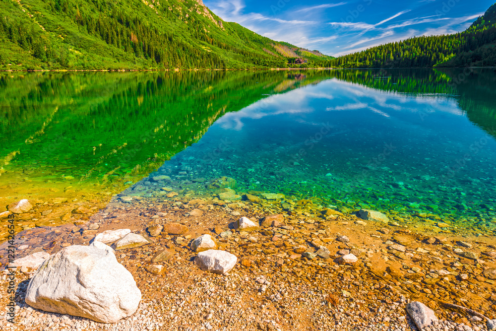 stones on the bottom of the lake, clear water, clear lake Morskie Oko in the Tatras - obrazy, fototapety, plakaty 