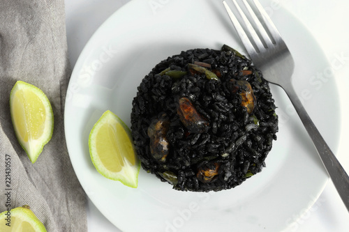 Traditional arroz negro - arròs negre - black rice dish, typical for Valencia