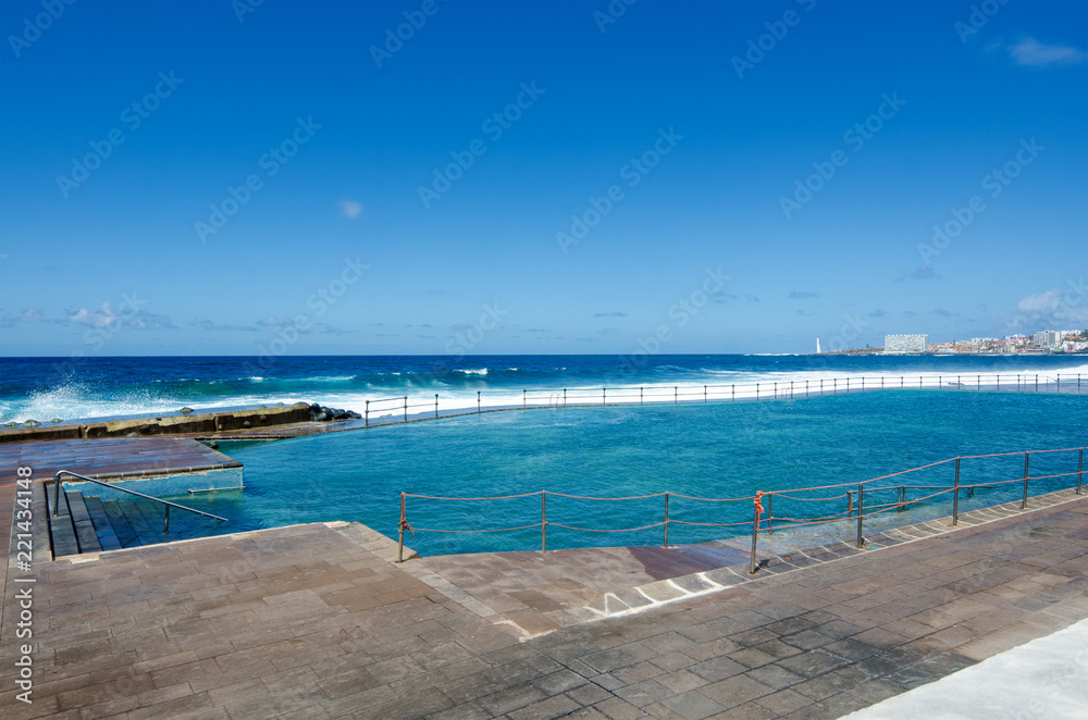 View of natural tide pool in the small fishing village of Bajamar. Municipality San Cristobal de La Laguna, Tenerife, Canary Islands, Spain. 