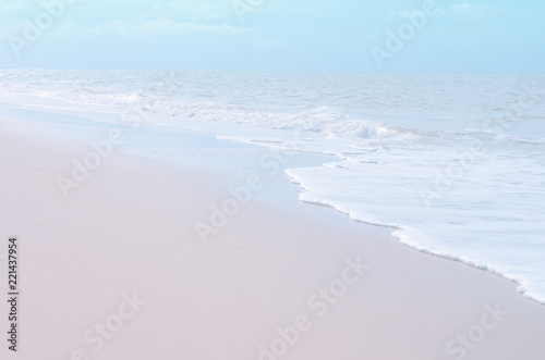 Summer beach and soft wave background. Sand and sea. Tropical summer vacation concept with tone color