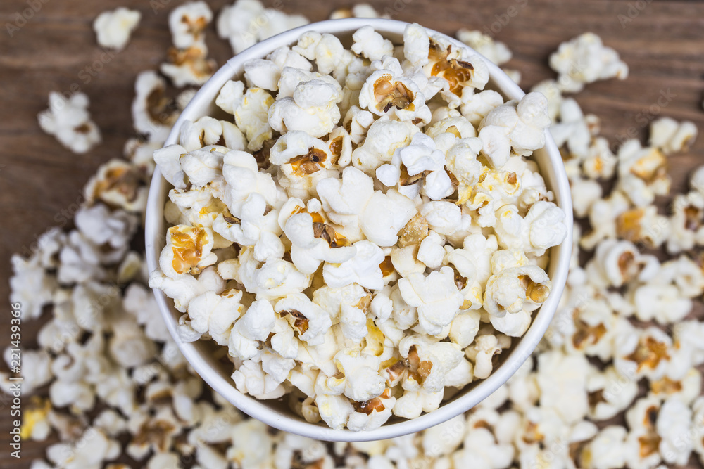 Salt popcorn on the wooden table, Salt popcorn on the wooden table,