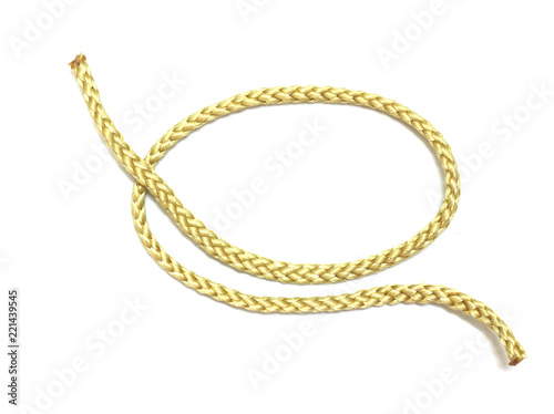 close up of gold rope on white background © naiauss
