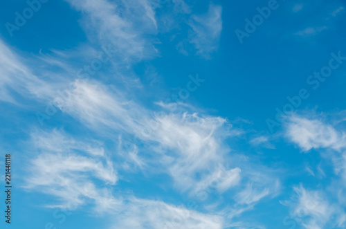 Textured background of blue sky with clouds