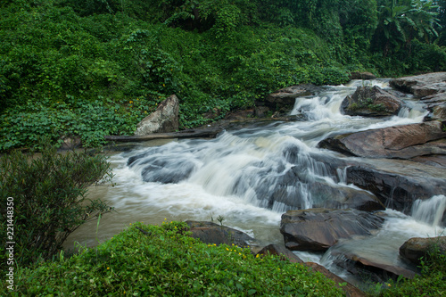 Waterfalls flowing down from the stream at  Mae Wang  waterfalls in Chiangmai  Thailand