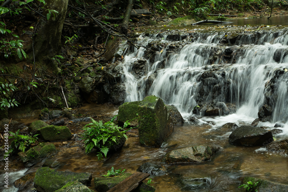 Fototapeta premium Waterfalls flowing down from the stream at 
