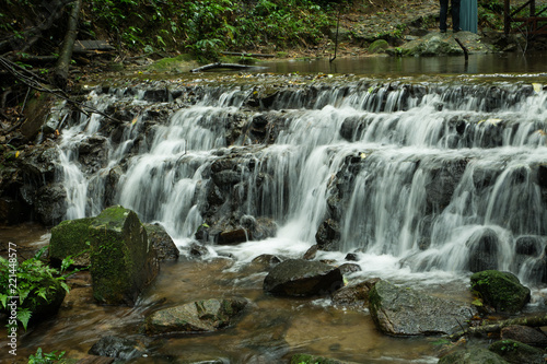 Waterfalls flowing down from the stream at  Mae Kampong  waterfall in Chiangmai  Thailand