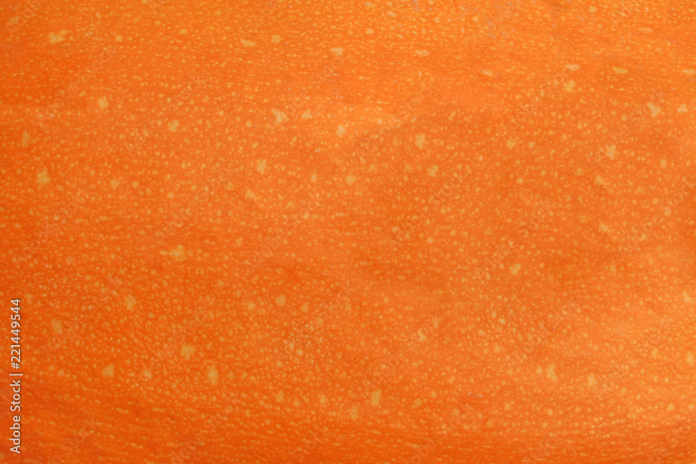 abstract orange background made of pumpkin skin