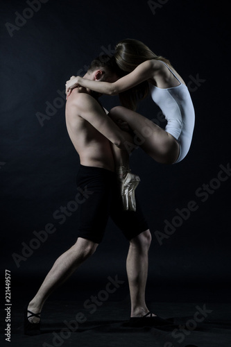 beautiful man and woman dancing ballet