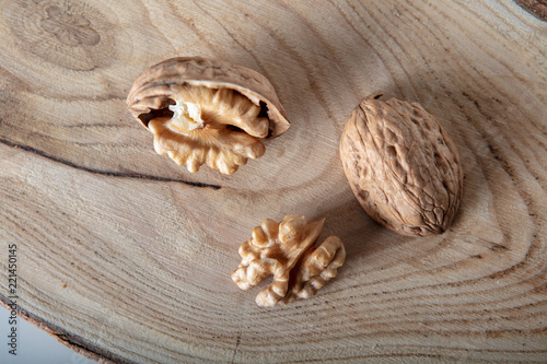 Walnuts on a wooden plate ..