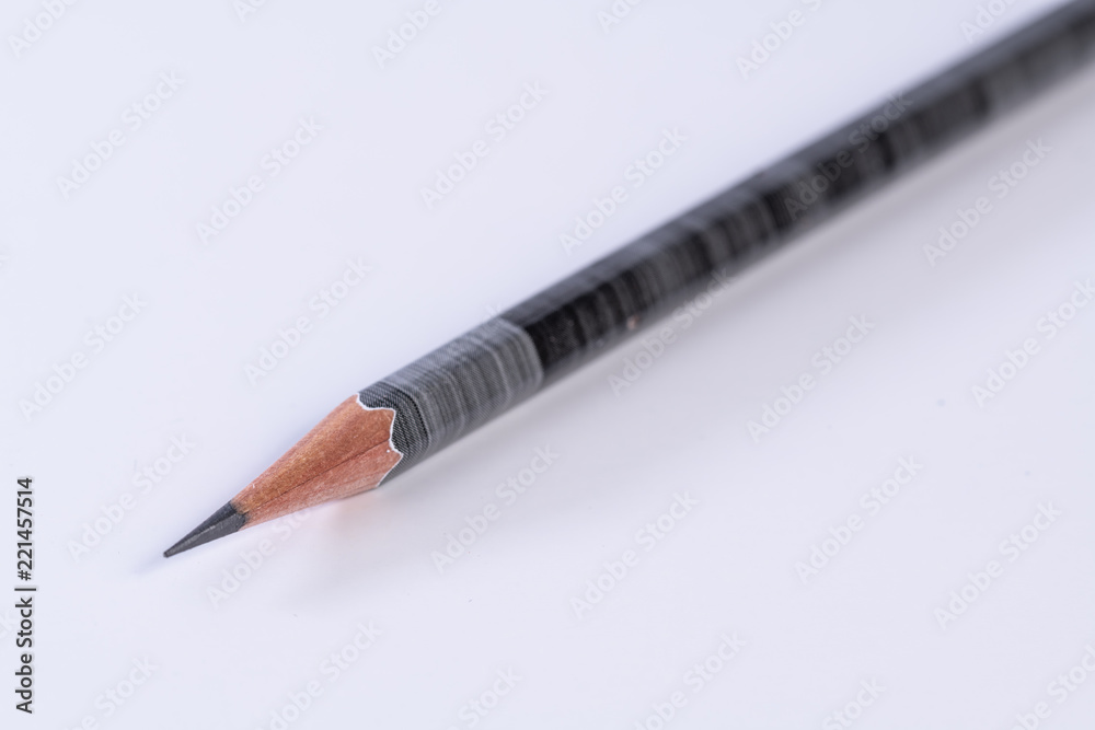 Single isolated black and gray stripe lead graphite pencil with a white background Single isolated black and gray stripe lead graphite pencil with a white background