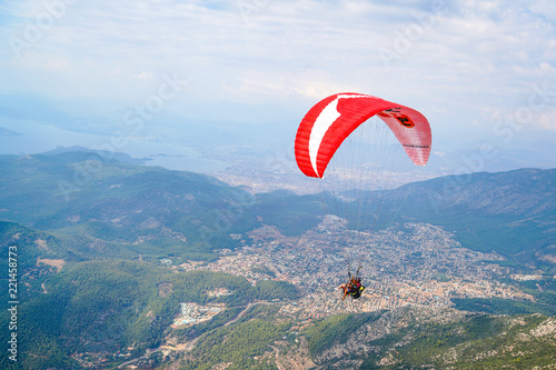 Fethiye, Mugla/Turkey- August 19 2018: Tandem paragliders on Fethiye