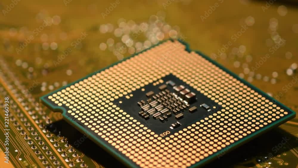 Close-up of cpu computer processor over electronic circuit board rotating on dolly. 4K Ultra HD video Close-up of cpu computer processor over electronic circuit board rotating on dolly. 4K Ultra HD video