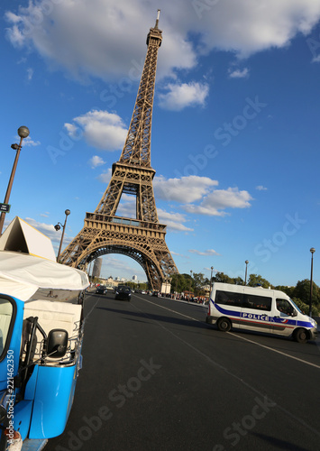 Roadblock with french police van and eiffel tower