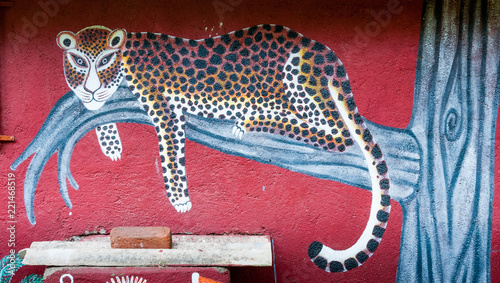 Art painted on the wall of a Warli temple inside Mumbai's SGNP. photo