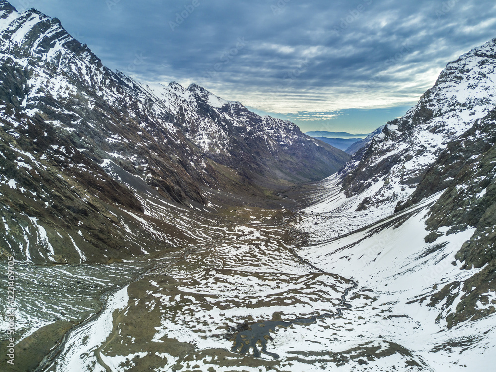 An aerial view of Andes mountains and valleys at 