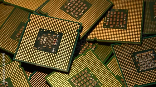 Wallpaper Mural closeup of Computer Chip Processors rotating on dolly. 4K UHD Video. Nikon D500 Torontodigital.ca