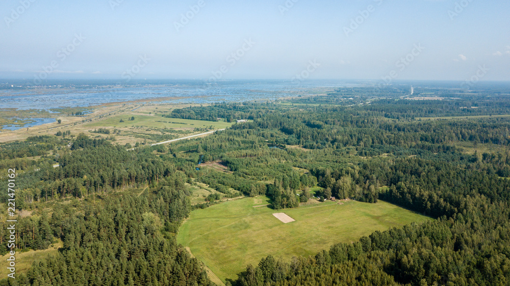 Obraz premium drone image. aerial view of rural area with fields and forests. textured background