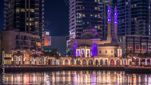 A view of a Mohammed Bin Ahmed Almulla Mosque. Night scene in the Dubai, Marina Dubai.