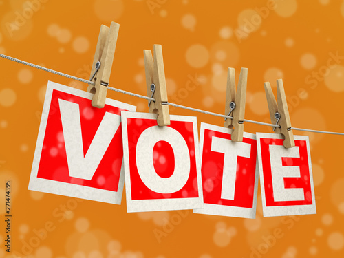 Wooden clothespins on rope with vote. Image with clipping path