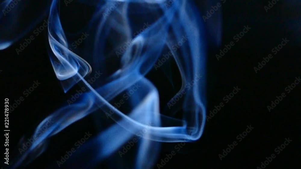 Live texture of beautiful smoke on a black background. Mystic smoke or steam. Cigarette smoke in slow motion. Live texture of beautiful smoke on a black background. Mystic smoke or steam. Cigarette smoke in slow motion.